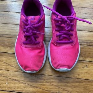 Girls pink and purple Nike sneakers